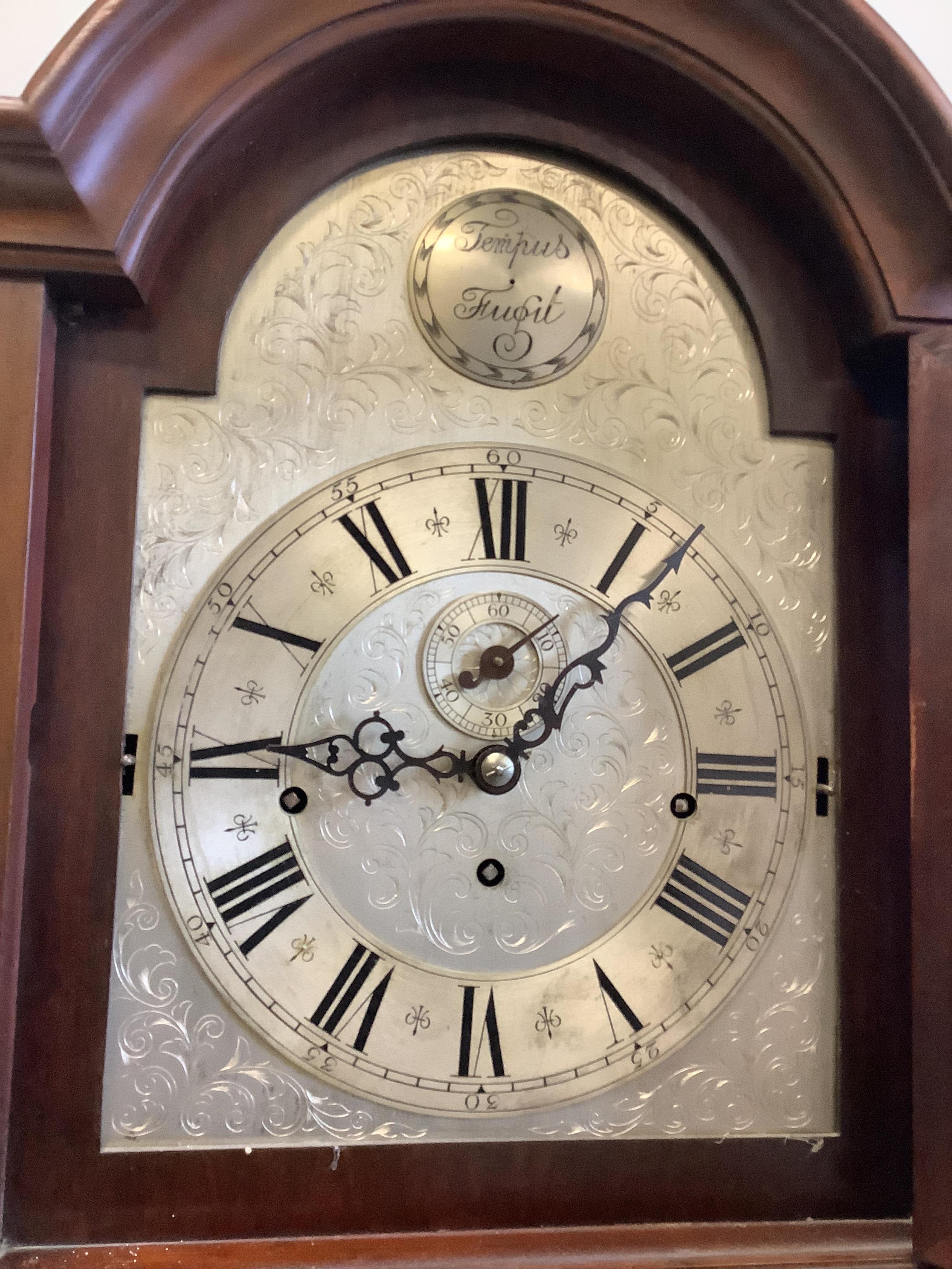 A modern mahogany cased eight day striking and chiming longcase clock, with a glazed door, height 188cm. Condition - good